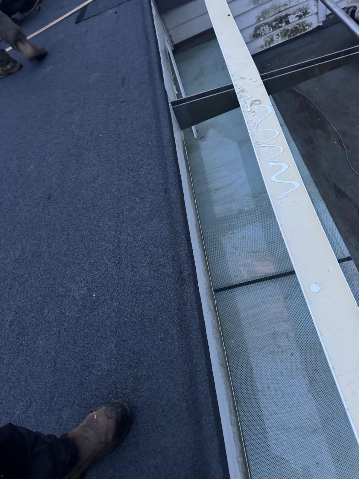 Flat roofing with skylight by JD Roofs